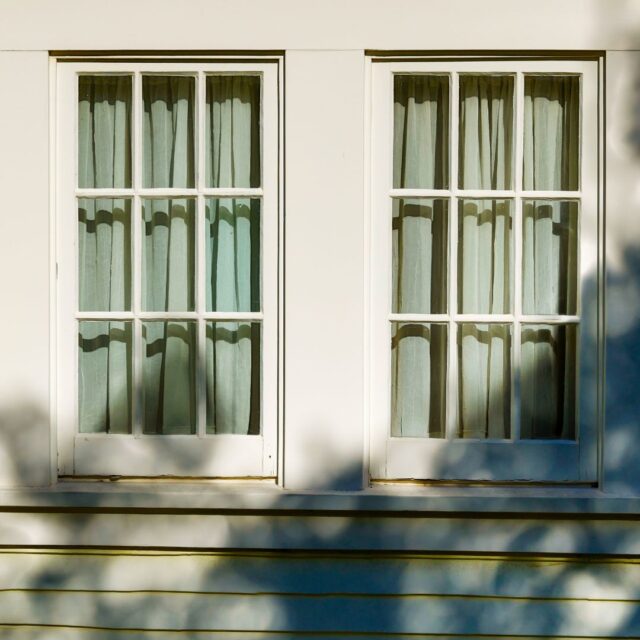 hurricane shutters vs impact windows